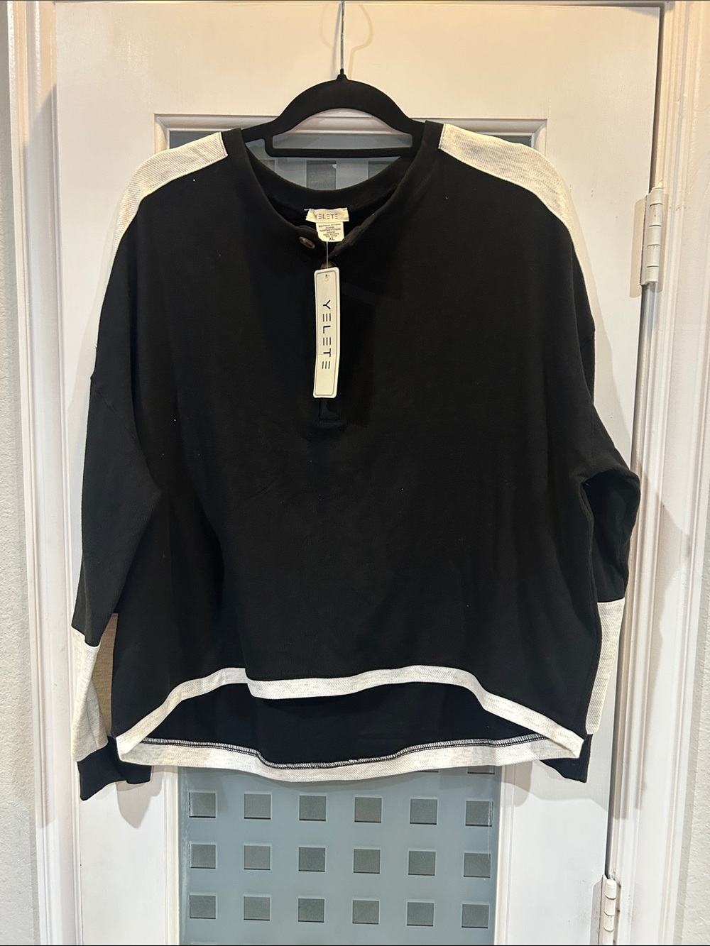 Yelete Black Pullover with Cream Accent Trim